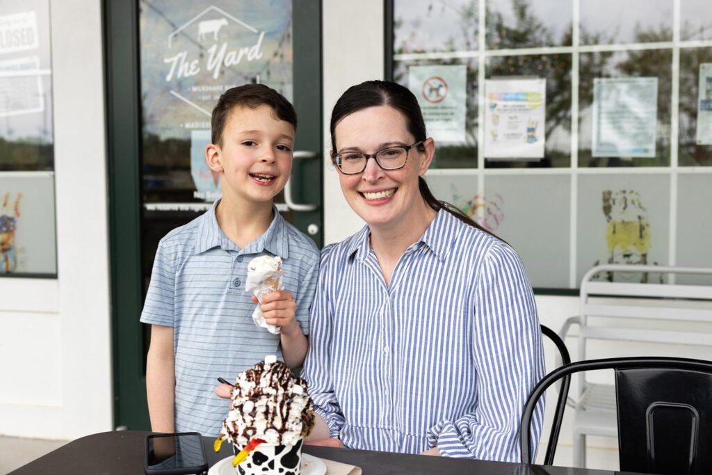 Mother and son eating ice cream in Town Madison