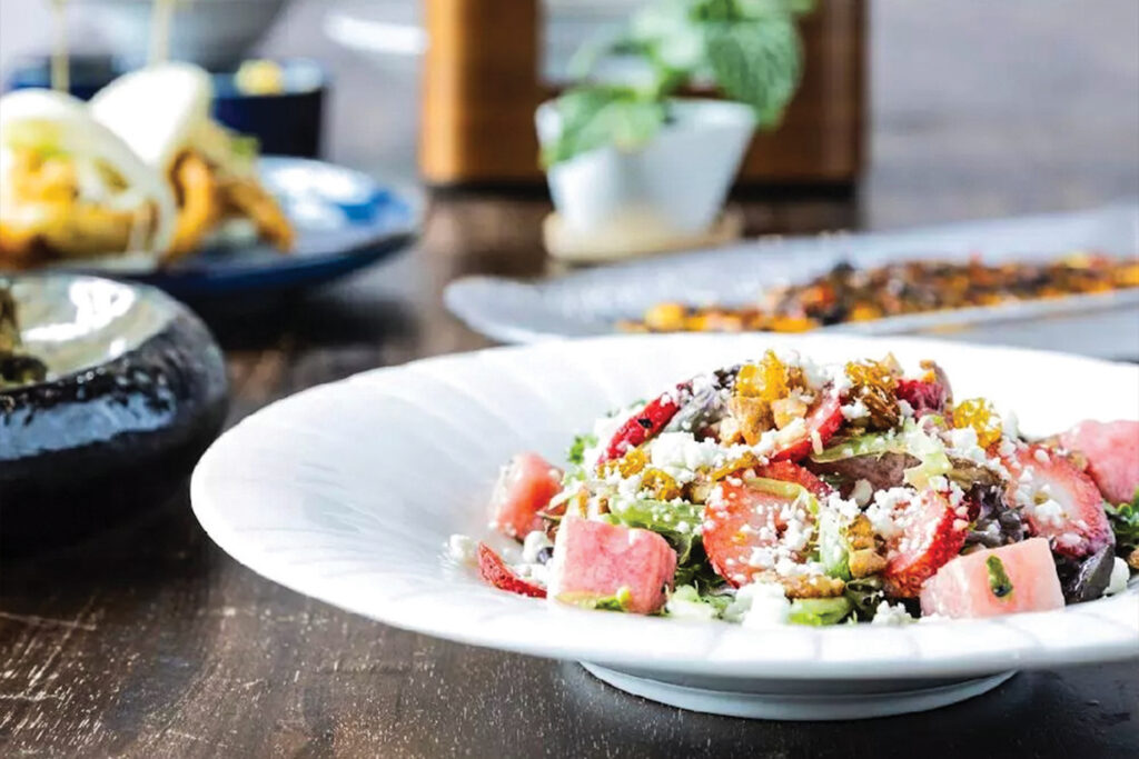 Salad on a white plate from Salt Smokehouse